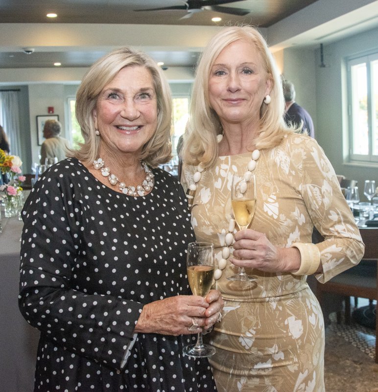 Sharing a smile at the dinner are Suzie Martin, Rehoboth Beach Main Street president, left, and dinner guest Leigh Jamison.